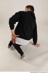 Man Adult Athletic White Kneeling poses Sportswear Dance